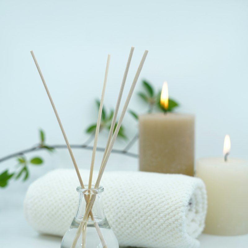 Candles and soft light in a spa setting.